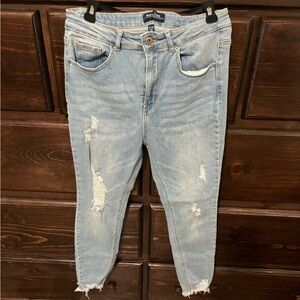 Distressed high waist skinny size 9